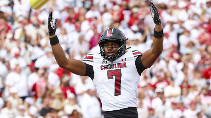 Oct 19, 2024; Norman, Oklahoma, USA;  South Carolina Gamecocks defensive back Nick Emmanwori (7) reacts after returning an interception for a touchdown during the first half against the Oklahoma Sooners at Gaylord Family-Oklahoma Memorial Stadium. Mandatory Credit: Kevin Jairaj-Imagn Images