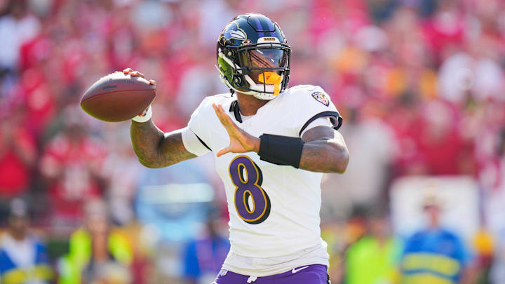 Sep 28, 2025; Kansas City, Missouri, USA; Baltimore Ravens quarterback Lamar Jackson (8) throws a pass during the first half against the Kansas City Chiefs at GEHA Field at Arrowhead Stadium. Mandatory Credit: Jay Biggerstaff-Imagn Images