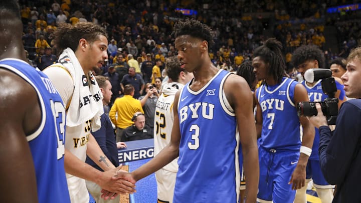 Feb 28, 2026; Morgantown, West Virginia, USA; BYU Cougars forward AJ Dybantsa (3) talks with West Virginia Mountaineers center Harlan Obioha (55) after the game at Hope Coliseum. Mandatory Credit: Ben Queen-Imagn Images Feb 28, 2026; Morgantown, West Virginia, USA; BYU Cougars forward AJ Dybantsa (3) talks with West Virginia Mountaineers center Harlan Obioha (55) after the game at Hope Coliseum. Mandatory Credit: Ben Queen-Imagn Images