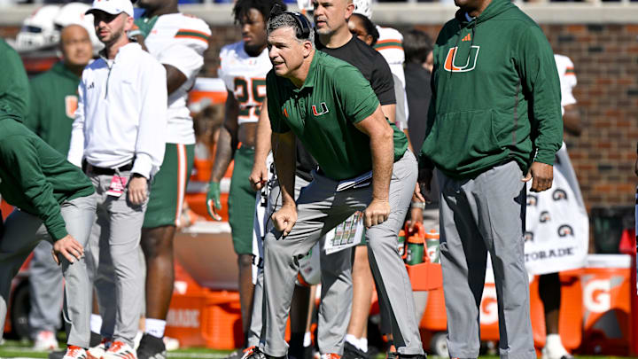 Nov 1, 2025; Dallas, Texas, USA;  Miami Hurricanes head coach Mario Cristobal looks on from the sidelines during the second half against the SMU Mustangs at Gerald J. Ford Stadium. Mandatory Credit: Jerome Miron-Imagn Images