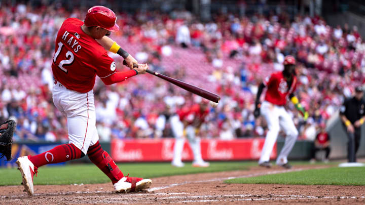 Cincinnati Reds left fielder Austin Hays (12) hits an RBI base hit in the sixth inning between Cincinnati Reds and New York Mets at Great American Ball Park in Cincinnati on Sept. 7, 2025. Cincinnati Reds left fielder Austin Hays (12) hits an RBI base hit in the sixth inning between Cincinnati Reds and New York Mets at Great American Ball Park in Cincinnati on Sept. 7, 2025.