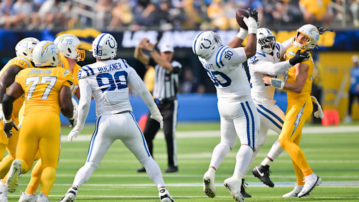 Oct 19, 2025; Inglewood, California, USA; Indianapolis Colts defensive tackle Grover Stewart (90) makes an interception in the first half against the Indianapolis Colts at SoFi Stadium. Mandatory Credit: Jayne Kamin-Oncea-Imagn Images Oct 19, 2025; Inglewood, California, USA; Indianapolis Colts defensive tackle Grover Stewart (90) makes an interception in the first half against the Indianapolis Colts at SoFi Stadium. Mandatory Credit: Jayne Kamin-Oncea-Imagn Images