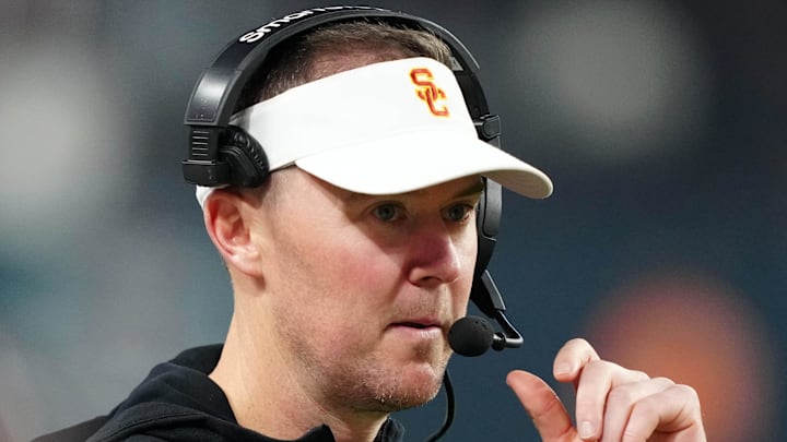 Dec 27, 2024; Las Vegas, NV, USA; Southern California Trojans head coach Lincoln Riley reacts against the Texas A&M Aggies in the second half at Allegiant Stadium. Mandatory Credit: Kirby Lee-Imagn Images Dec 27, 2024; Las Vegas, NV, USA; Southern California Trojans head coach Lincoln Riley reacts against the Texas A&M Aggies in the second half at Allegiant Stadium. Mandatory Credit: Kirby Lee-Imagn Images