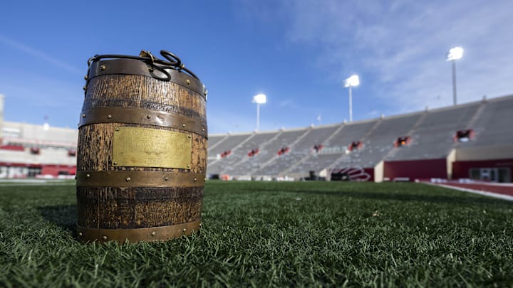The Old Oaken Bucket sits on the field before the Purdue Boilermakers and Indiana Hoosiers' 2022 matchup at Memorial Stadium. 