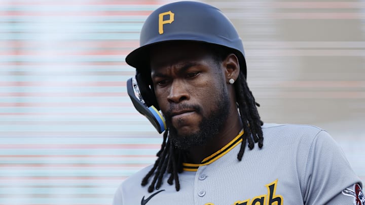 Jun 17, 2025; Detroit, Michigan, USA;  Pittsburgh Pirates outfielder Oneil Cruz (15) walks off the field in the first inning against the Detroit Tigers at Comerica Park. Mandatory Credit: Rick Osentoski-Imagn Images