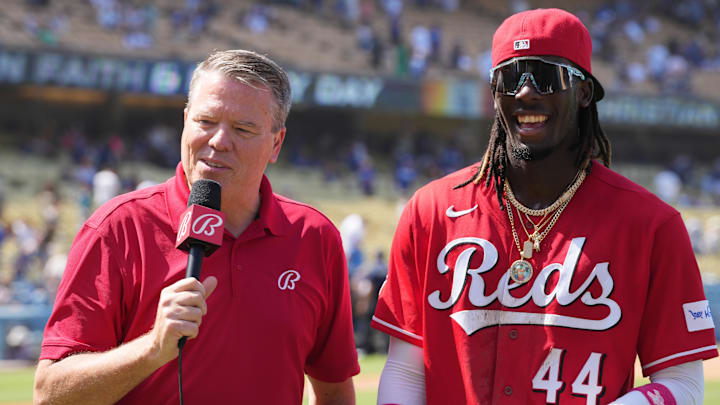 Jul 30, 2023; Los Angeles, California, USA; Bally Sports reporter Jim Day (left) interviews Cincinnati Reds shortstop Elly De La Cruz (44) after the game against the Los Angeles Dodgers at Dodger Stadium. Mandatory Credit: Kirby Lee-Imagn Images