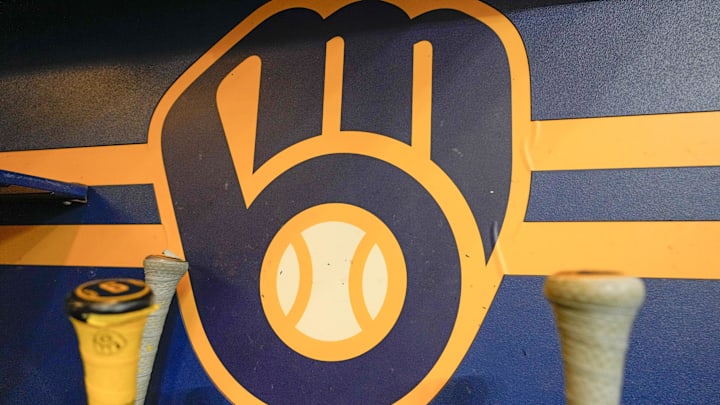 Apr 18, 2025; Milwaukee, Wisconsin, USA; General view of the Milwaukee Brewers logo in the dugout during batting practice prior to the game against the Athletics at American Family Field. Mandatory Credit: Jeff Hanisch-Imagn Images Apr 18, 2025; Milwaukee, Wisconsin, USA; General view of the Milwaukee Brewers logo in the dugout during batting practice prior to the game against the Athletics at American Family Field. Mandatory Credit: Jeff Hanisch-Imagn Images