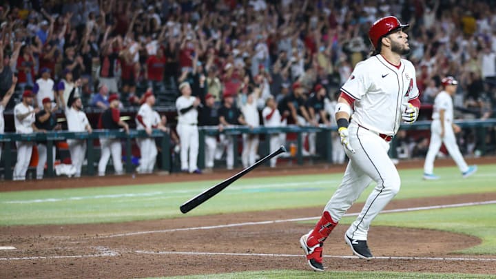 Arizona Diamondbacks third base Eugenio Suarez (28) drops his bat after hitting a walk-off single on Sept. 15, 2024 at Chase Field in Phoenix. Arizona Diamondbacks third base Eugenio Suarez (28) drops his bat after hitting a walk-off single on Sept. 15, 2024 at Chase Field in Phoenix.