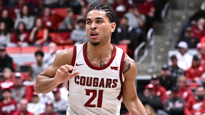 Jan 15, 2026; Pullman, Washington, USA; Washington State Cougars guard Ace Glass Lll (21) controls the ball against the Gonzaga Bulldogs in the first half at Friel Court at Beasley Coliseum. Mandatory Credit: James Snook-Imagn Images