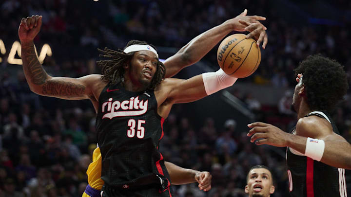 Feb 20, 2025; Portland, Oregon, USA; Portland Trail Blazers center Robert Williams III (35) grabs a rebound during the second half against the Los Angeles Lakers at Moda Center. Mandatory Credit: Troy Wayrynen-Imagn Images