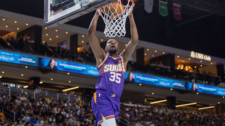 Oct 6, 2024; Palm Desert, California, USA; Phoenix Suns forward Kevin Durant (35) dunks against the Los Angeles Lakers during the first half at Acrisure Arena. Mandatory Credit: David Frerker-Imagn Images