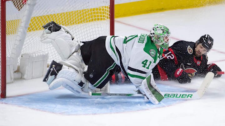 Feb 22, 2024; Ottawa, Ontario, CAN; Ottawa Senators center Mark Kastelic (12) slides into Dallas