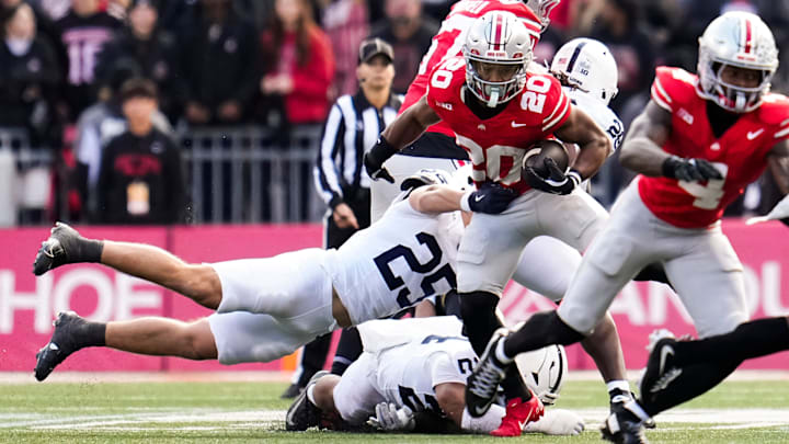 Ohio State Buckeyes running back James Peoples (20) runs past Penn State Nittany Lions linebacker Alex Tatsch (25)