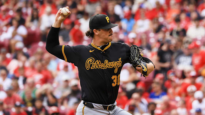 Pittsburgh Pirates starting pitcher Paul Skenes (30) pitches against the Cincinnati Reds in the first inning at Great American Ball Park. 