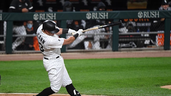 Chicago White Sox catcher James McCann (33) hits a RBI single against the Minnesota Twins during the third inning at Guaranteed Rate Field in 2020. Chicago White Sox catcher James McCann (33) hits a RBI single against the Minnesota Twins during the third inning at Guaranteed Rate Field in 2020.