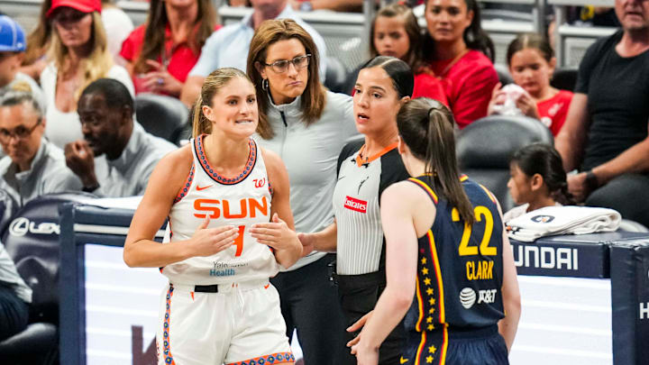 Connecticut Sun guard Sheldon expresses frustration with Indiana Fever guard Clark during a game between the Indiana Fever and the Connecticut Sun at Gainbridge Fieldhouse in Indianapolis.
