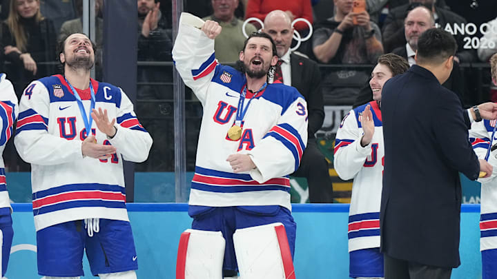 Goaltender Connor Hellebuyck (center) was Team USA’s best player on Sunday, stopping 41 of 42 shots. 