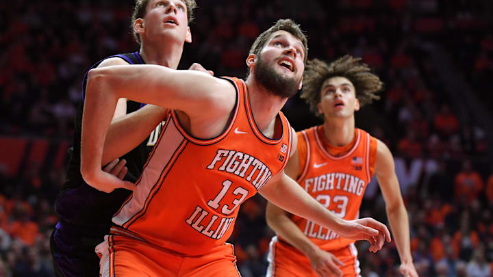 Jan 29, 2026; Champaign, Illinois, USA;  Illinois Fighting Illini center Tomislav Ivisic (13) and Washington Huskies forward Hannes Steinbach (6) battle for position during the second half at State Farm Center. Mandatory Credit: Ron Johnson-Imagn Images