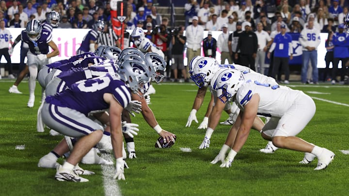 Sep 21, 2024; Provo, Utah, USA;  The Kansas State Wildcats offense lines up against the Brigham Young Cougars defense during the first quarter at LaVell Edwards Stadium. Mandatory Credit: Rob Gray-Imagn Images