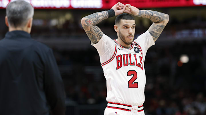 Dec 8, 2024; Chicago, Illinois, USA; Chicago Bulls guard Lonzo Ball (2) reacts during the second half of a basketball game against the Philadelphia 76ers at United Center. Mandatory Credit: Kamil Krzaczynski-Imagn Images