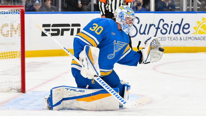 Mar 13, 2026; St. Louis, Missouri, USA; St. Louis Blues goaltender Joel Hofer (30) makes a glove save against the Edmonton Oilers during the first period at Enterprise Center. Mandatory Credit: Jeff Curry-Imagn Images