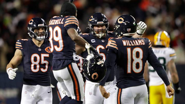 Chicago Bears QB Caleb Williams is swarmed by teammates. Dan Powers/USA TODAY NETWORK-Wisconsin / USA TODAY NETWORK