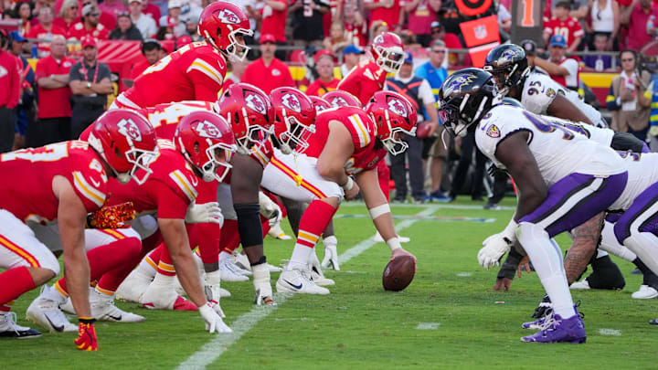 Sep 28, 2025; Kansas City, Missouri, USA; Kansas City Chiefs quarterback Patrick Mahomes (15) at the line of scrimmage against the Baltimore Ravens during the game at GEHA Field at Arrowhead Stadium. Mandatory Credit: Denny Medley-Imagn Images