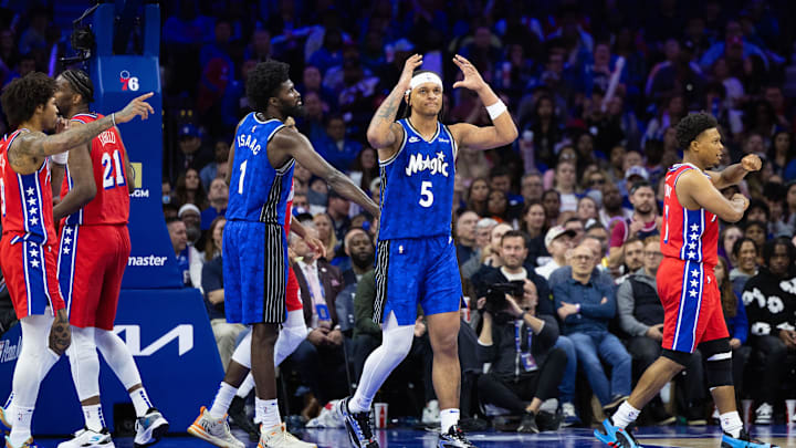Apr 12, 2024; Philadelphia, Pennsylvania, USA; Orlando Magic forward Paolo Banchero (5) reacts after his missed shot against the Philadelphia 76ers during the fourth quarter at Wells Fargo Center. Mandatory Credit: Bill Streicher-Imagn Images