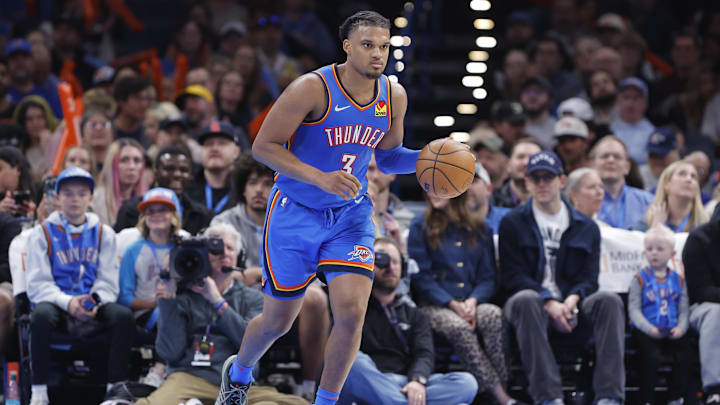 Mar 19, 2025; Oklahoma City, Oklahoma, USA; Oklahoma City Thunder forward Dillon Jones (3) dribbles down the court against the Philadelphia 76ers during the second half at Paycom Center.