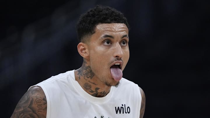 Mar 8, 2025; Milwaukee, Wisconsin, USA; Milwaukee Bucks forward Kyle Kuzma (18) reacts during pregame warmups before a game against the Orlando Magic at Fiserv Forum. 