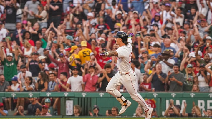 Aug 4, 2025; Boston, Massachusetts, USA; Boston Red Sox outfielder Jarren Duran (16) hits a three run home run against the Kansas City Royals in the first inning at Fenway Park. Mandatory Credit: David Butler II-Imagn Images