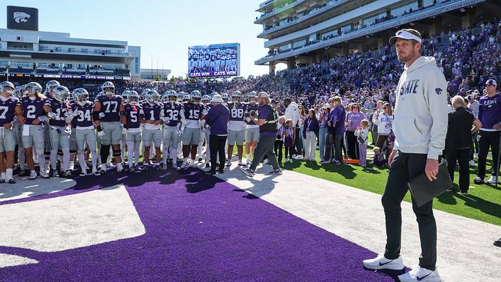 Oct 17, 2026; Manhattan, Kansas, USA; Kansas State Wildcats head coach Collin Klein waits for his team to gather before going to the locker room following a win against the Kansas Jayhawks at Bill Snyder Family Football Stadium. Mandatory Credit: Scott Sewell-Imagn Images Oct 17, 2026; Manhattan, Kansas, USA; Kansas State Wildcats head coach Collin Klein waits for his team to gather before going to the locker room following a win against the Kansas Jayhawks at Bill Snyder Family Football Stadium. Mandatory Credit: Scott Sewell-Imagn Images