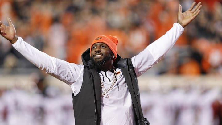 Nov 27, 2021; Stillwater, Oklahoma, USA; Oklahoma State Cowboys former receiver Dez Bryant waves to the fans during the first half of a game against the Oklahoma Sooners at Boone Pickens Stadium. Mandatory Credit: Alonzo Adams-Imagn Images