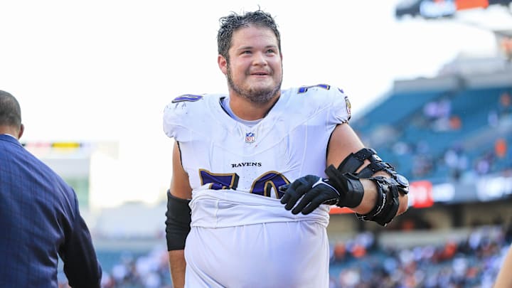Oct 6, 2024; Cincinnati, Ohio, USA; Baltimore Ravens offensive tackle Roger Rosengarten (70) walks off the field after the victory over the Cincinnati Bengals at Paycor Stadium. Mandatory Credit: Katie Stratman-Imagn Images Oct 6, 2024; Cincinnati, Ohio, USA; Baltimore Ravens offensive tackle Roger Rosengarten (70) walks off the field after the victory over the Cincinnati Bengals at Paycor Stadium. Mandatory Credit: Katie Stratman-Imagn Images