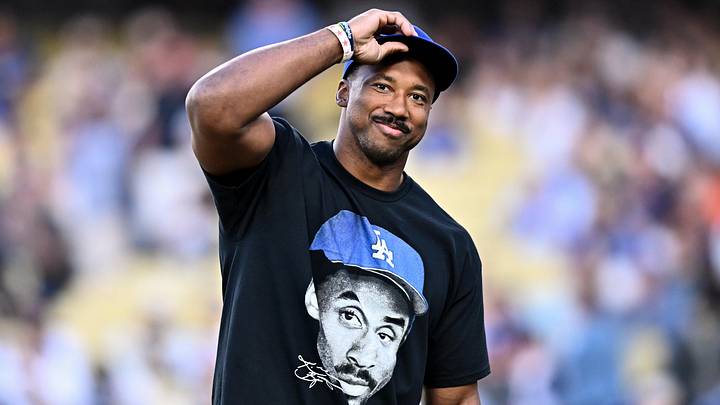 Jun 6, 2026; Los Angeles, California, USA; Los Angeles Rams defensive end Myles Garrett looks on prior to throwing out the honorary first pitch before a game between the Los Angeles Angels and Los Angeles Dodgers at Dodger Stadium. Mandatory Credit: William Liang-Imagn Images Jun 6, 2026; Los Angeles, California, USA; Los Angeles Rams defensive end Myles Garrett looks on prior to throwing out the honorary first pitch before a game between the Los Angeles Angels and Los Angeles Dodgers at Dodger Stadium. Mandatory Credit: William Liang-Imagn Images