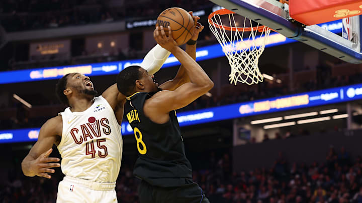 Apr 2, 2026; San Francisco, California, USA; Cleveland Cavaliers guard Donovan Mitchell (45) blocks the shot by Golden State Warriors forward/center De'Anthony Melton (8) during the second quarter at Chase Center. Mandatory Credit: Kelley L Cox-Imagn Images