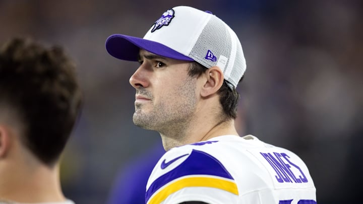 Jan 13, 2025; Glendale, AZ, USA; Minnesota Vikings quarterback Daniel Jones (13) against the Los Angeles Rams during an NFC wild card game at State Farm Stadium. Mandatory Credit: Mark J. Rebilas-Imagn Images