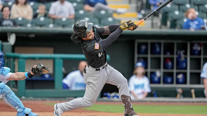 El Paso infielder Connor Joe (9) hits a single during the home opener Minor League baseball game between the Oklahoma City Comets and the El Paso Chihuahuas at Chickasaw Bricktown Ballpark in Oklahoma City on Tuesday, April 1, 2025.