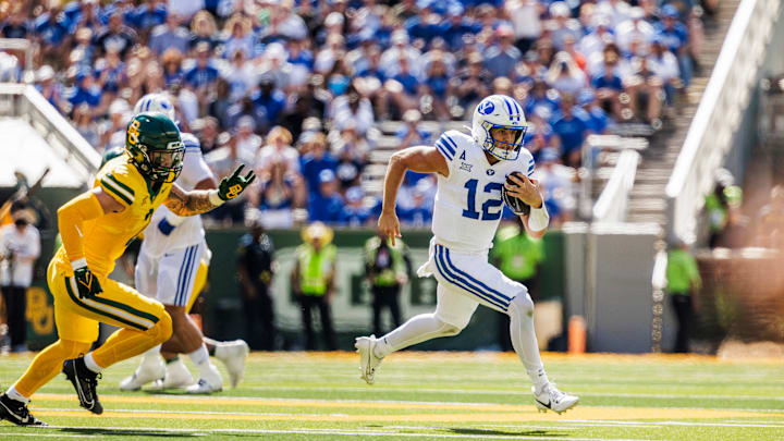 BYU quarterback Jake Retzlaff runs against Baylor