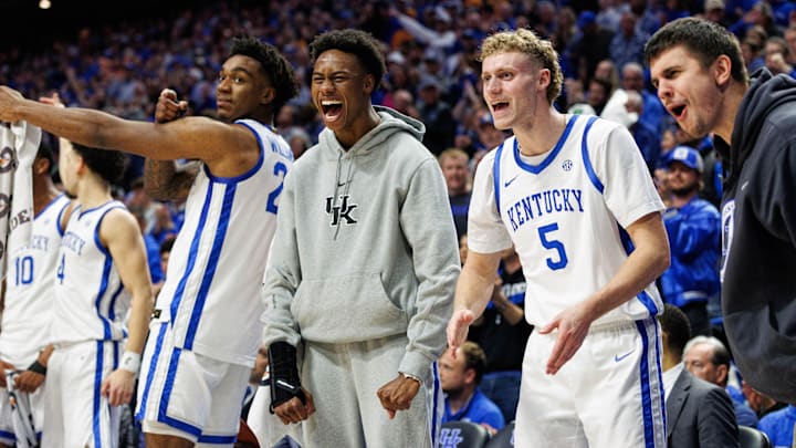 Feb 11, 2025; Lexington, Kentucky, USA; Kentucky Wildcats center Amari Williams (22), guard Jaxson Robinson (2), guard Collin Chandler (5) and guard Kerr Kriisa (77) celebrate from the bench during the first half against the Tennessee Volunteers at Rupp Arena at Central Bank Center. Mandatory Credit: Jordan Prather-Imagn Images