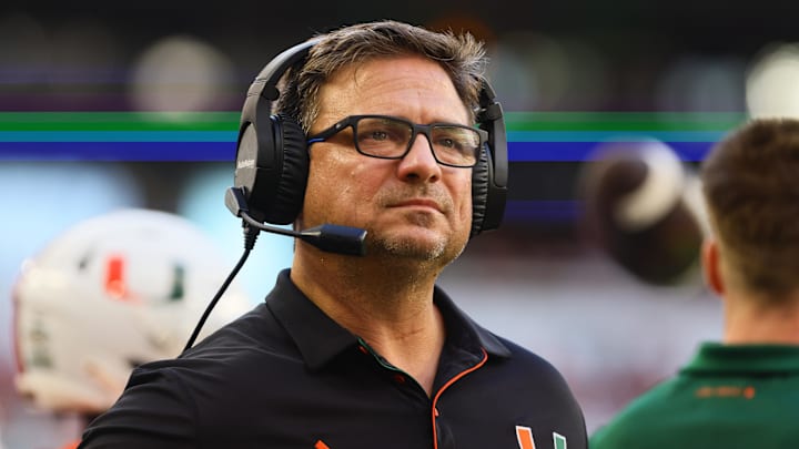 Sep 7, 2024; Miami Gardens, Florida, USA; Miami Hurricanes offensive coordinator Shannon Dawson looks on from the sideline against the Florida A&M Rattlers during the first quarter at Hard Rock Stadium. Mandatory Credit: Sam Navarro-Imagn Images