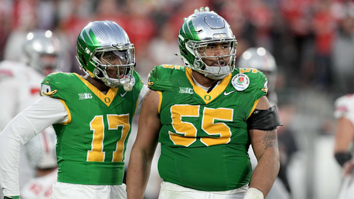 Jan 1, 2025; Pasadena, CA, USA; Oregon Ducks defensive lineman Derrick Harmon (55) reacts in the second half against the Ohio State Buckeyes in the 2025 Rose Bowl college football quarterfinal game at Rose Bowl Stadium. Mandatory Credit: Kirby Lee-Imagn Images Jan 1, 2025; Pasadena, CA, USA; Oregon Ducks defensive lineman Derrick Harmon (55) reacts in the second half against the Ohio State Buckeyes in the 2025 Rose Bowl college football quarterfinal game at Rose Bowl Stadium. Mandatory Credit: Kirby Lee-Imagn Images
