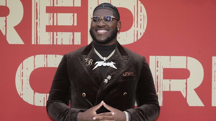 Alabama Crimson Tide offensive guard Tyler Booker on the red carpet before the 2025 NFL Draft at Lambeau Field. 