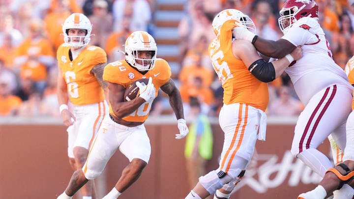 Tennessee running back DeSean Bishop (18) runs the ball during a college football game between Tennessee and Arkansas at Neyland Stadium in Knoxville, Tennessee on Oct. 11, 2025.