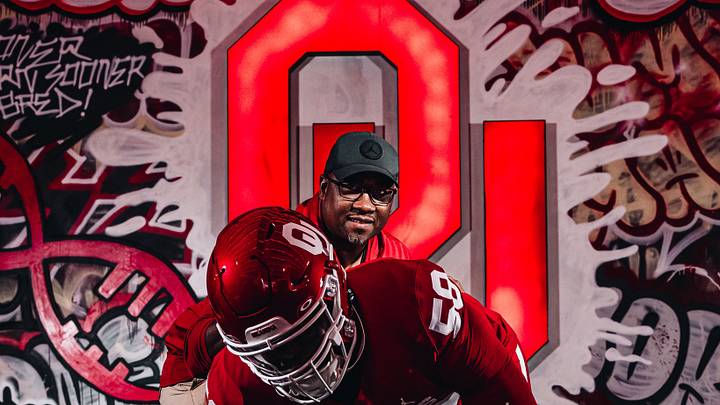 Oklahoma defensive lineman James Carrington, defensive tackles coach Todd Bates Oklahoma defensive lineman James Carrington, defensive tackles coach Todd Bates