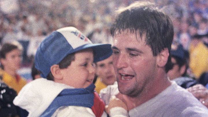 Jan 25, 1987; Pasadena, CA, USA; FILE PHOTO; New York Giants nose tackle Jim Burt holds his son Jim Burt Jr after defeating the Denver Broncos during Super Bowl XXI at the Rose Bowl. The Giants defeated the Broncos 39-20. Jan 25, 1987; Pasadena, CA, USA; FILE PHOTO; New York Giants nose tackle Jim Burt holds his son Jim Burt Jr after defeating the Denver Broncos during Super Bowl XXI at the Rose Bowl. The Giants defeated the Broncos 39-20.