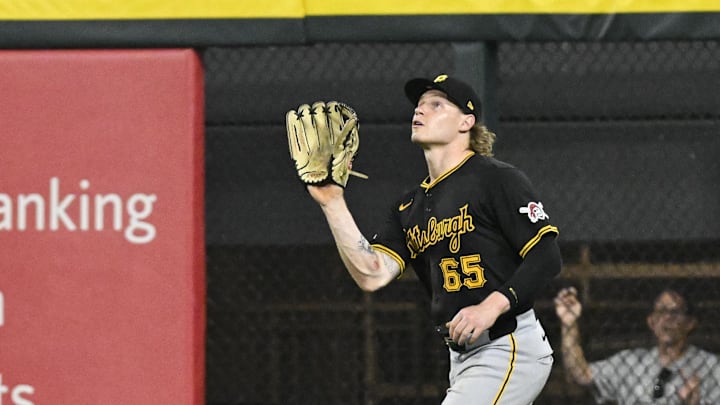 Jul 12, 2024; Chicago, Illinois, USA;  Pittsburgh Pirates outfielder Jack Suwinski (65) catches a fly ball hit by Chicago White Sox catcher Korey Lee (26) during the seventh inning at Guaranteed Rate Field. Mandatory Credit: Matt Marton-Imagn Images