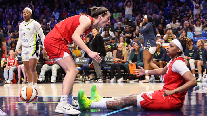 Jul 17, 2024; Arlington, Texas, USA; Indiana Fever guard Caitlin Clark (22) celebrates with Indiana Fever forward NaLyssa Smith (1) during the second half against the Dallas Wings at College Park Center. Mandatory Credit: Kevin Jairaj-Imagn Images Jul 17, 2024; Arlington, Texas, USA; Indiana Fever guard Caitlin Clark (22) celebrates with Indiana Fever forward NaLyssa Smith (1) during the second half against the Dallas Wings at College Park Center. Mandatory Credit: Kevin Jairaj-Imagn Images