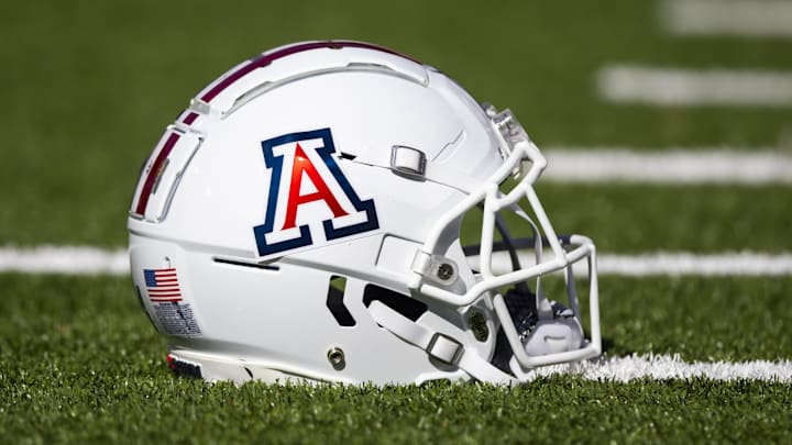 Nov 25, 2022; Tucson, Arizona, USA; Detailed view of an Arizona Wildcats helmet on the field during the Territorial Cup at Arizona Stadium. Mandatory Credit: Mark J. Rebilas-Imagn Images