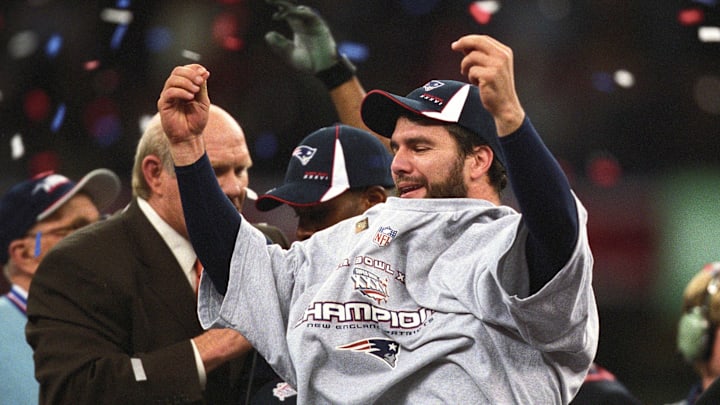 Feb 3, 2002; New Orleans, LA, USA; New England Patriots kicker Adam Vinatieri (4) celebrates winning Super Bowl XXXVI against the St. Louis Rams at the Louisiana Superdome. The Patriots defeated the Rams 20-17. FILE PHOTO; Mandatory Credit: Imagn Images